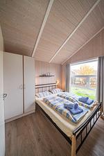 Schlafzimmer mit Doppelbett - Ferienhaus Wellnessoase - Top-Hundeurlaub