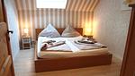 Schlafzimmer - Ferienwohnung Berdumer Mühlenblick - Top-Hundeurlaub