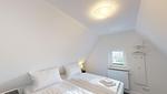 Schlafzimmer - Ferienwohnung 2 Strandkorb - Top-Hundeurlaub