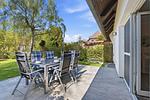 Terrasse mit Esstisch, Grill und Garten - Kuttels Koje - Top-Hundeurlaub