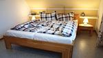 Schlafzimmer - Ferienhaus Haus am Harlepad - Top-Hundeurlaub