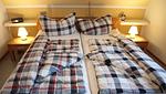 Schlafzimmer - Ferienhaus Haus am Harlepad - Top-Hundeurlaub