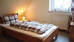 Schlafzimmer - Ferienhaus Haus am Harlepad - Top-Hundeurlaub