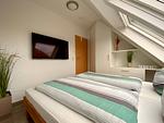 Schlafzimmer - Ferienwohnung Dat Ferienhus Norddeich Whg. 6 - Top-Hundeurlaub