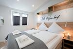 Schlafzimmer - Ferienhaus "Quartier 104" mit eingezäuntem Grundstück - Top-Hundeurlaub