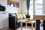 Wohnzimmer - Ferienhaus "Sonneneck", eingezäuntes Grundstück (114) - Top-Hundeurlaub