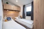 Schlafzimmer - Ferienhaus "Sonneneck", eingezäuntes Grundstück (114) - Top-Hundeurlaub