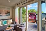 Wohnzimmer - Ferienhaus "Heimathafen" mit eingezäuntem Grundstück (116) - Top-Hundeurlaub