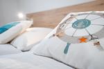 Schlafzimmer - Ferienhaus "Heimathafen" mit eingezäuntem Grundstück (116) - Top-Hundeurlaub