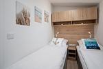 Schlafzimmer - Ferienhaus "Heimathafen" mit eingezäuntem Grundstück (116) - Top-Hundeurlaub