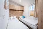 Schlafzimmer - Ferienhaus "Heimathafen" mit eingezäuntem Grundstück (116) - Top-Hundeurlaub