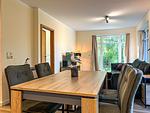 Wohnzimmer mit Essbereich - Wohnung 04 - Achterwind - Top-Hundeurlaub