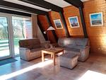 Wohnzimmer - Nurdachhaus FUXBAU - Top-Hundeurlaub