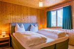 Schlafzimmer - Apartment Bergdohle - Top-Hundeurlaub