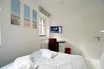 Schlafzimmer 2 TV - Strandstraße 18c, Whg. 7, Haus Paul - Top-Hundeurlaub