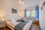 Schlafzimmer - Ferienwohnung Schrabbe nur 800 Meter zum Strand mit Terrasse - Top-Hundeurlaub