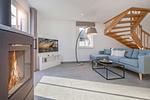 Wohnzimmer - Ferienhaus Örnie mit Sauna, Kamin und Sonnenterrasse - Top-Hundeurlaub