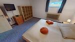 Schlafzimmer - Haus Wiesenweg 14 M - Top-Hundeurlaub