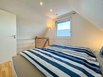 Schlafzimmer - Ferienhaus Seepferdchen Ringwall  86a - Top-Hundeurlaub