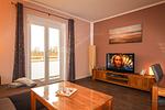 Cuxland-Fewo-Service - Haus Frauenpreiss-Wohnung 62 - Wohnzimmer - Haus Frauenpreiss Wohnung 62 - Top-Hundeurlaub