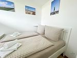 Cuxland-Fewo-Service-Haus Essen-Wohnung 22-Schlafzimmer - Haus Essen Wohnung 22 - Top-Hundeurlaub