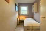 zweites Schlafzimmer mit Einzelbett - Wohnung 24 - Top-Hundeurlaub