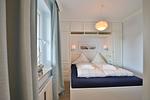 Strandmuschel Haffkrug: Erholsamer Schlaf dank heller Fenster und gemütlichem Bett. - Strandmuschel - Top-Hundeurlaub