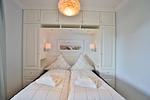 Strandmuschel Haffkrug: Schlafzimmer mit harmonischem Design und durchdachtem Stauraum. - Strandmuschel - Top-Hundeurlaub