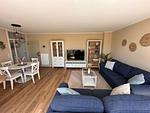 Wohnzimmer - Maisonette Ferienwohnung "Barke App. 26" mit seitlichem Meerblick in Scharbeutz - Top-Hundeurlaub