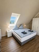 Schlafzimmer - Maisonette Ferienwohnung "Barke App. 26" mit seitlichem Meerblick in Scharbeutz - Top-Hundeurlaub