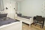 Schlafzimmer - FeWo Steilküste mit Terrasse - Top-Hundeurlaub