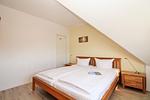 Schlafzimmer - Haus Olymp Fewo 28 - Top-Hundeurlaub