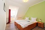 Schlafzimmer - Haus Olymp Fewo 28 - Top-Hundeurlaub