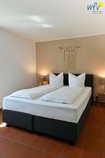 Schlafzimmer - Ferienwohnung Strandroggen - Top-Hundeurlaub
