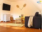 Wohnzimmer - Ferienwohnung Strandkamille - Top-Hundeurlaub