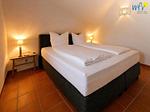 Schlafzimmer - Ferienwohnung Strandkamille - Top-Hundeurlaub