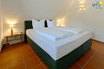 Schlafzimmer - Ferienwohnung Strandkamille - Top-Hundeurlaub