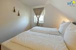 Schlafzimmer - Ferienwohnung Strandkamille - Top-Hundeurlaub