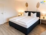 Schlafzimmer - Ferienwohnung Sonnenaufgang - Top-Hundeurlaub