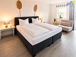 Schlafzimmer - Ferienwohnung Sonnenaufgang - Top-Hundeurlaub