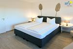 Schlafzimmer - Ferienwohnung Sonnenaufgang - Top-Hundeurlaub