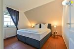 Schlafzimmer - Ferienwohnung Sonnenrose - Top-Hundeurlaub