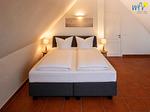 Schlafzimmer - Ferienwohnung Sonnenstrahl - Top-Hundeurlaub