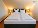 Schlafzimmer - Ferienwohnung Sonnenmorgen - Top-Hundeurlaub