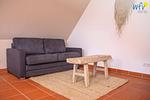 Wohnzimmer - Ferienwohnung Sonnenmorgen - Top-Hundeurlaub