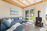 Wohnzimmer - Ferienhaus Wellenreiter Olpenitz - Top-Hundeurlaub