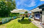 Gartenblick - Ferienhaus DEICHBLICK - Top-Hundeurlaub