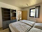 Schlafzimmer - Ferienhaus DEICHLÄUFER - Top-Hundeurlaub