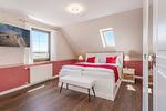 Schlafzimmer - Ferienhaus Sonnendeck mit Sauna, Kamin & Terrasse für 12 Personen - Top-Hundeurlaub