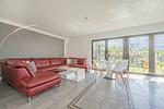 Wohnzimmer - Ferienhaus Sonnendeck mit Sauna, Kamin & Terrasse für 12 Personen - Top-Hundeurlaub